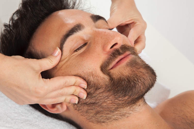 massaging your face mens