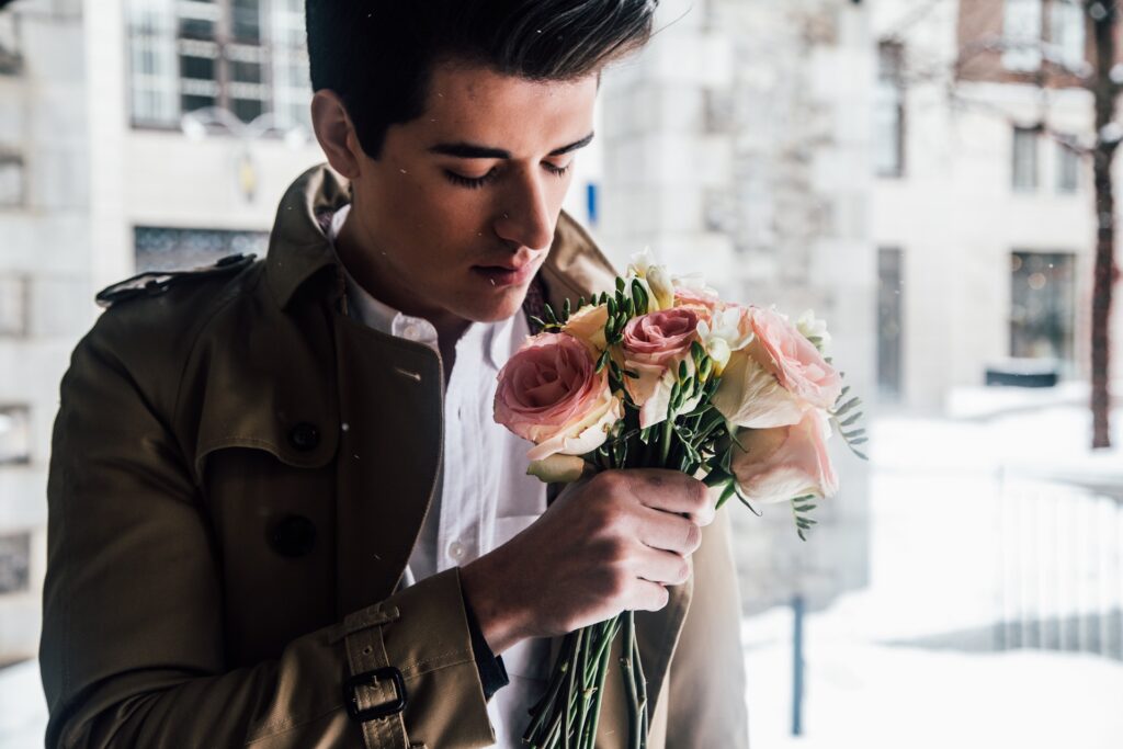 man buying flowers